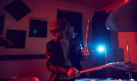 handsome-man-rocking-drums-BZT9MKX (1)